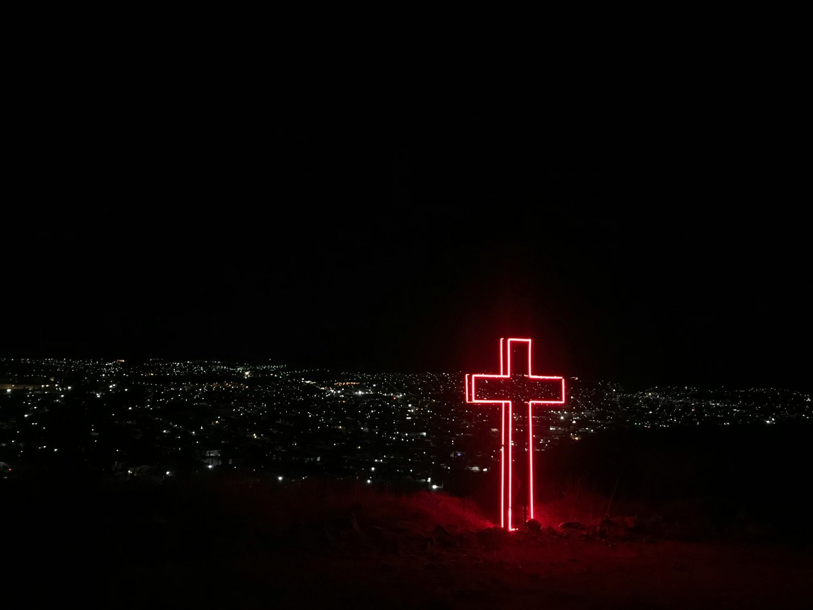 red neon light cross signage